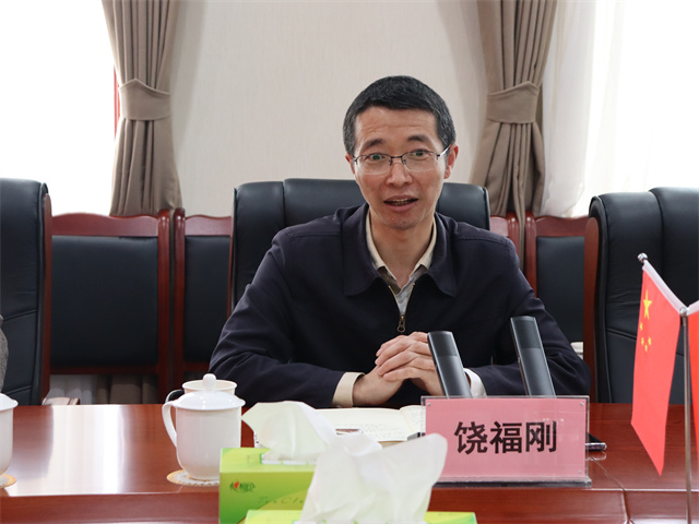 鄧華會見宜賓市供銷社黨委書記、理事會主任饒福剛一行